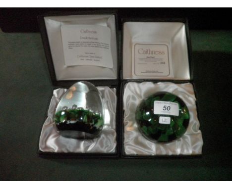 Two boxed Caithness paperweights, including a limited edition Sea Pearl weight, number 345/500 and a Double Harlequin weight.