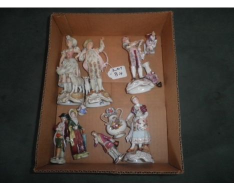 A mixed lot of German, Austrian and Italian porcelain figures, including musician, pair of bisque figures and others similar.