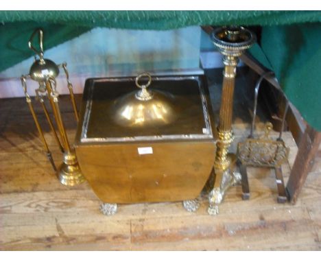 A brass trivet, companion set coal box on four paw feet and a brass corinthian column table candlestick.