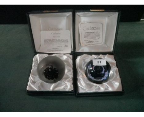 Two boxed limited edition Caithness paperweights, including a Jubilee Floating Crown weight, number 167/1000 and a Sea Orchid