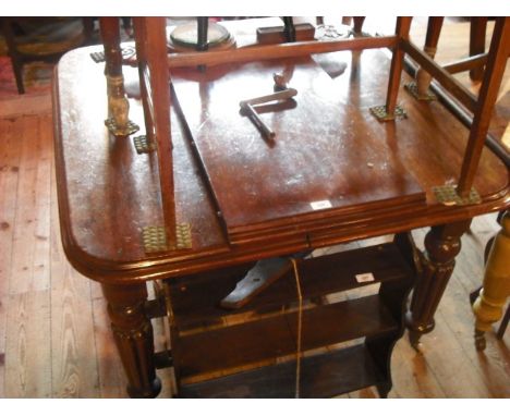 A William IV  mahogany extending dining table, the rectangular top with moulded edge on four turned and lobed supports with c