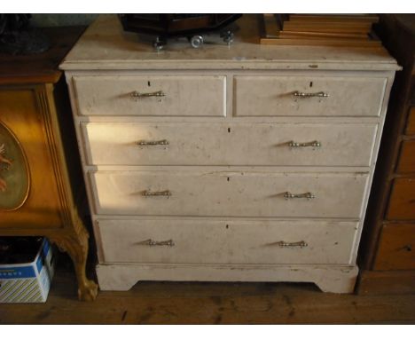 A 19th century, later white painted pine chest, the rectangular top over two short and three graduated long drawers on bracke