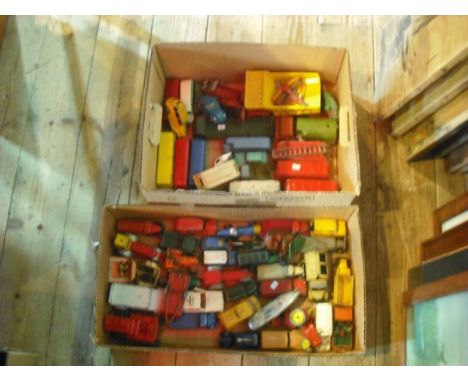 Two boxes of Dinky toys and other die-cast vehicles, including buses, commercial vehicles, fire engine, racing and saloon car