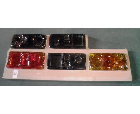Five Whitefriars architectural glass slabs of rectangular form (17 x 8cm approx.) in tangerine and pewter colours, typically 