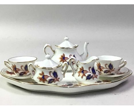 CROWN STAFFORDSHIRE MINIATURE TEA SERVICE, AND OTHER CERAMICS  the tea service incluidng a shaped oval tray, along with a gro