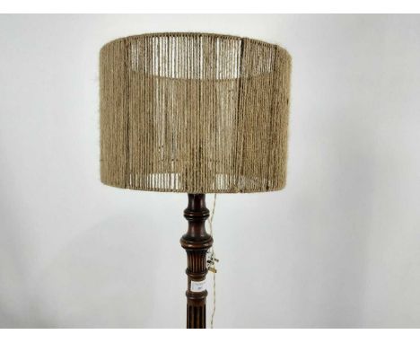 MAHOGANY STANDARD LAMP, with shade and on a circular base 137cm high