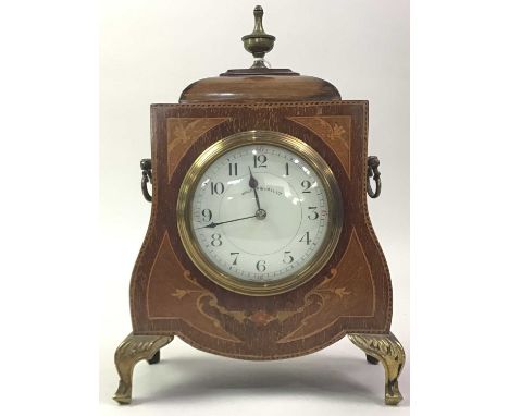 EDWARDIAN MANTEL CLOCK, the white enamel dial with Arabic numeral, the architectural form case with urn finial25cm highKey pr