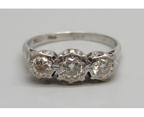 An 18ct white gold, three stone brilliant cut diamond ring, over 0.50ct, 3.6g, P 