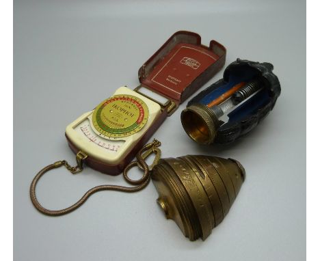 Two demonstrator cut-away models of a hand grenade and bomb fuse plus a Zeiss Ikon light meter 