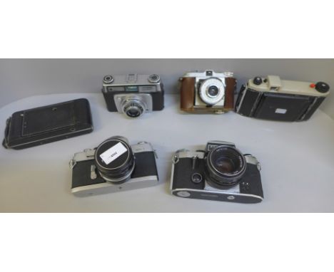 Six vintage cameras including Minolta and Viscount 