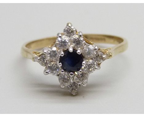 A 9ct gold, sapphire and white stone cluster ring, 2.1g, N 