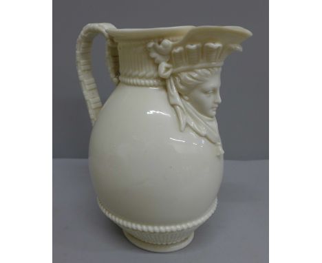 A Royal Worcester face mask jug, 21cm 