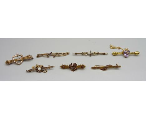 Seven c1900 brooches, six 9ct gold including one hallmarked Birmingham 1904, one other yellow metal set with an opal, test as