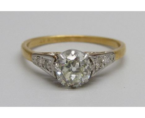 An antique 18ct gold and platinum set diamond solitaire ring with diamond shoulders, 2.7g, P, with insurance valuation replac