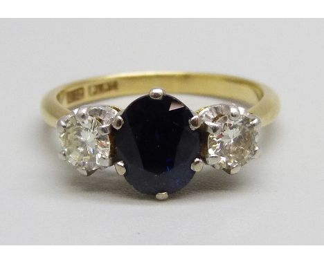 An 18ct gold, platinum set diamond and sapphire ring, 4.2g, O 