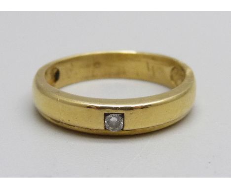 An 18ct gold, diamond solitaire ring, 3g, K 