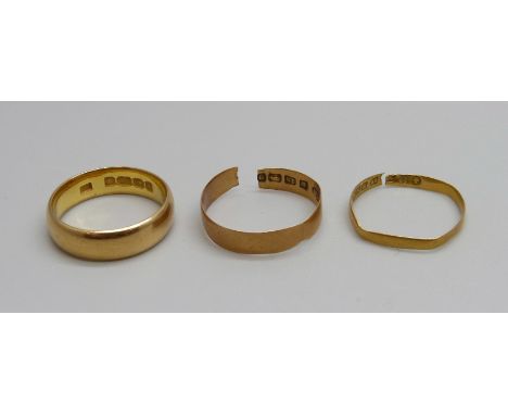 A 22ct gold wedding ring, 6g, M, one other 22ct gold ring, a/f, 0.8g, and an 18ct gold ring, a/f, 1.1g 