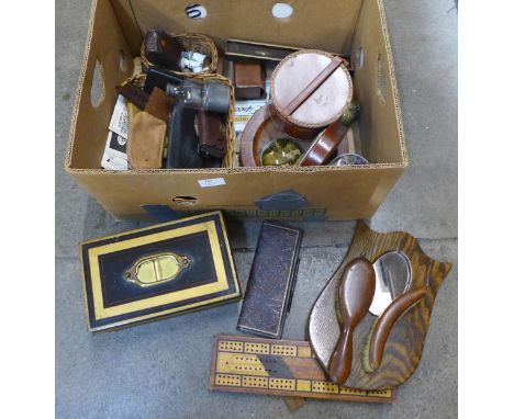 A collection of vintage items; a wooden cribbage board and marker pad, a hall mirror and brush set, a collar box, leather pur