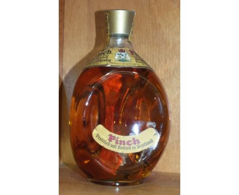 A 4/5 quart bottle of Haig & Haig Pinch Scotch Whisky, 86o proof.