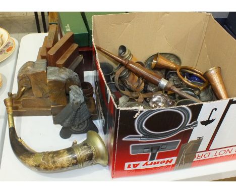 A brass-mounted cow horn hunting horn, 31cm, a pair of teak book ends from the teak of HMS Iron Duke, a pair of wooden elepha