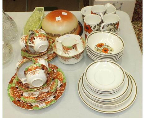 Twenty-five pieces of J G Meakin studio teaware decorated with poppies, nineteen pieces of an Edwardian green, black, red, br