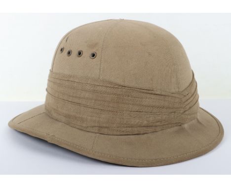 1942 Foreign Service Helmet, short brimmed foreign service helmet in the style similar to a East of Malta flying helmet. 10 f