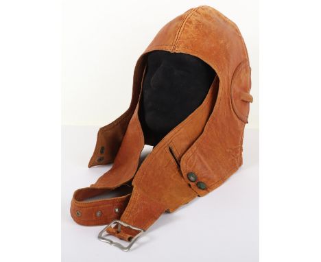 Early Leather Aviators Flying Helmet, light tan leather flying helmet with ear cups to the sides. Thick leather chinstrap and