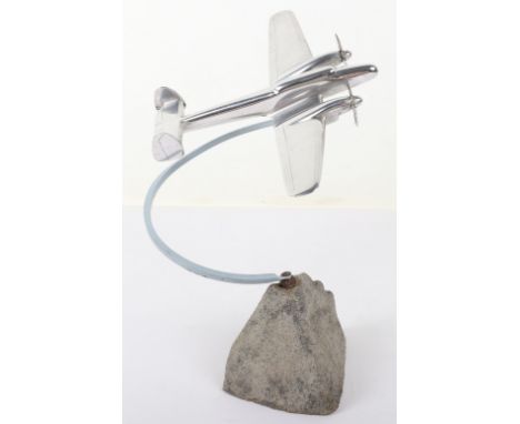 Stylised Desk Model of a WW2 Bomber Aircraft, fine chrome model of a twin engine bomber aircraft mounted onto a rock base. De