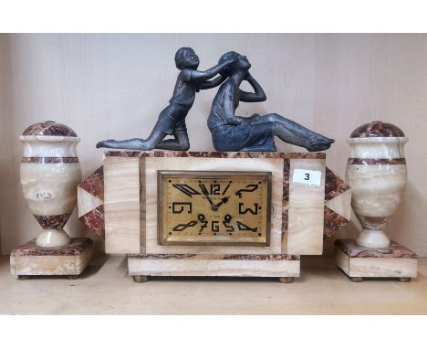 An Art Deco figural marble and spelter clock set, H. 34cm.