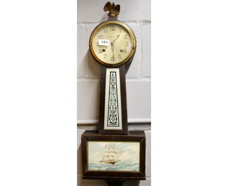 An early 20th century American 'banjo' wall clock, H. 79cm. (Understood to be in working order).