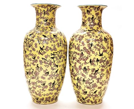 An interesting pair of large Chinese porcelain vases with yellow crackle glaze and enamel decoration of birds among blossom, 