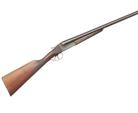 Wooden butt, cast off for the right shoulder, chequered straight grip and forend, plain rib, automatic safety inlaid 'SAFE' i