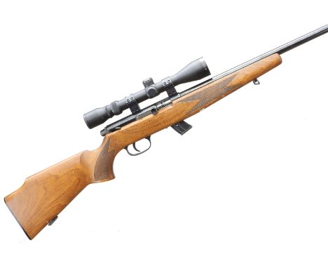 "A .22lr Krico self loading rifle. Serial No.Z96928. Std. Specs. Pistol grip stock with comb, fitted Optik 9 x 40 Scope. Near