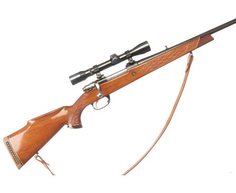 A .243 Win Parker Hale bolt action rifle. Serial No.16647C. Std. Specs. Fitted sling and Micro-Trak Scope. Magazine missing. 