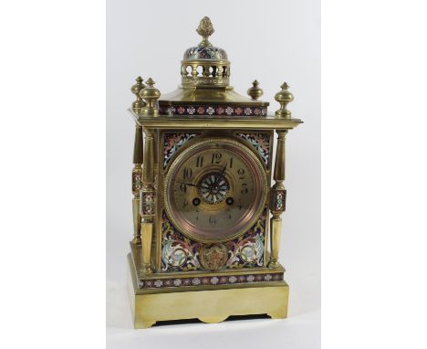 A fine quality 19th Century French brass and Champlevé enamel mantel clock
Having pierced finial above circular dial with Ara