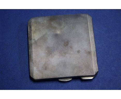 An Art Deco silver engine turned powder compact, by William Neale & Son Ltd, 6.7cm.