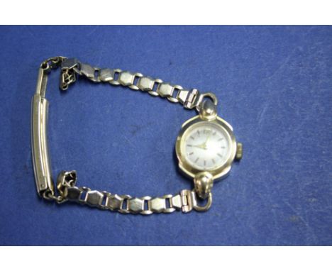 A vintage Omega 18ct gold ladies wristwatch, on 9ct gold bracelet.   Condition Report:  Weight 16.5g including movement,  In 
