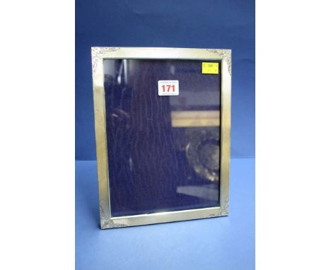 A continental 800 silver engine turned photograph frame.