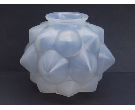A Lalique opalescent glass 'champagne' pattern vase, of rounded form, the surface moulded with bold projecting conical flutes