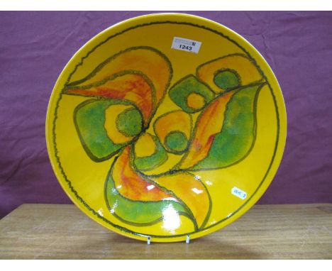 Poole Pottery Bowl, 1970s,Aegean style, abstract design on yellow/orange ground numbered 58, monogrammed indistinctly, 34cm d