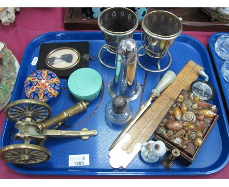 A Pair of Arts &amp; Crafts Style Brass Ecclesiastical Cups in silver plated frames, 11cm tall, a brass cannon, a military (N