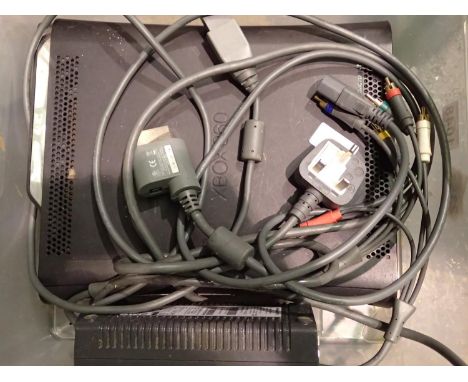 Microsoft Xbox 360 games console, with power supply and AV cable, untested. All electrical items in this lot have been PAT te