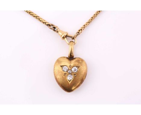 A diamond set heart-shaped locket and chain, consisting of a yellow metal locket with bead set diamonds in a trefoil motif, e