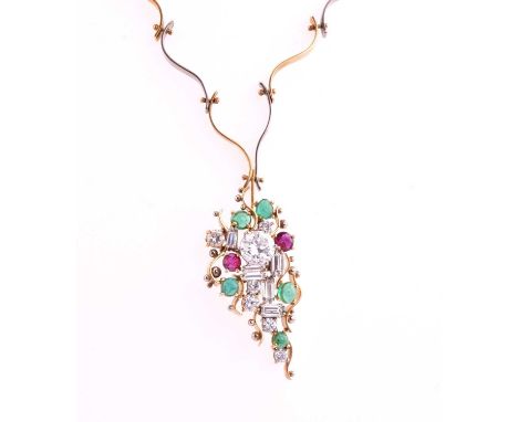 A diamond and ruby cluster pendant and chain; the abstract drop pendant comprising a central old transitional cut diamond; si