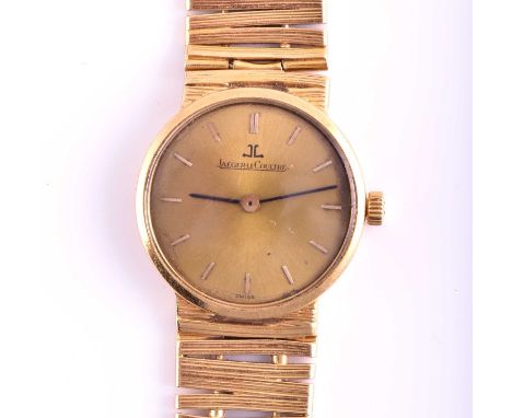 A Jaeger LeCoultre 18ct yellow gold lady's wristwatch with a Swiss-made ultra-thin hand-wound movement in an 18ct yellow gold
