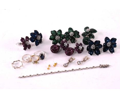 A collection of paste and cubic zirconia flowerhead jewellery; comprising of a ring and a pair of drop earrings, a ring and p