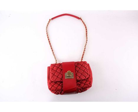 A Moschino red quilted handbag with gilt flip-clasp, with a chain-link strap, with tags and together with dust bag, 29cm wide