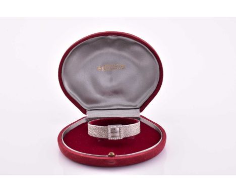 A lady's white gold diamond set Omega wristwatch with a hand-wound Swiss movement, a 14mm square case with a diamond-set beze