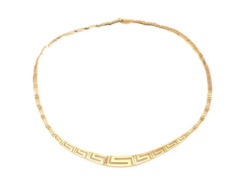 An articulated necklace consisting of graduated Greek keys hinged links, with a tongue and groove clasp and a figure of eight