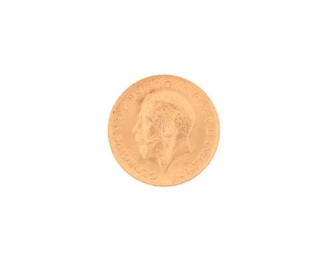 A George V Royal Mint full Sovereign gold coin, dated 1914, total weight of item 7.9 grams.